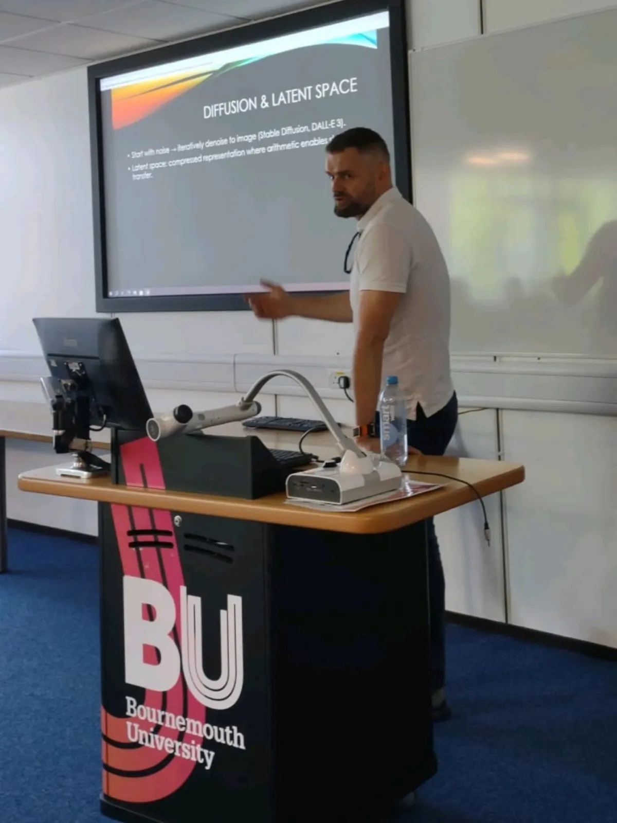 Greg presenting in a Bournemouth University lecture room